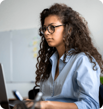 side-view-woman-working-laptop 1